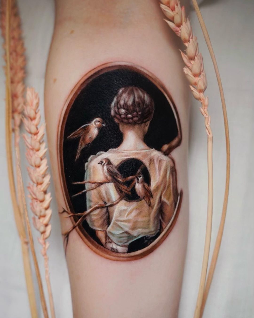 Framed painting-style colour tattoo by Ink District Amsterdam