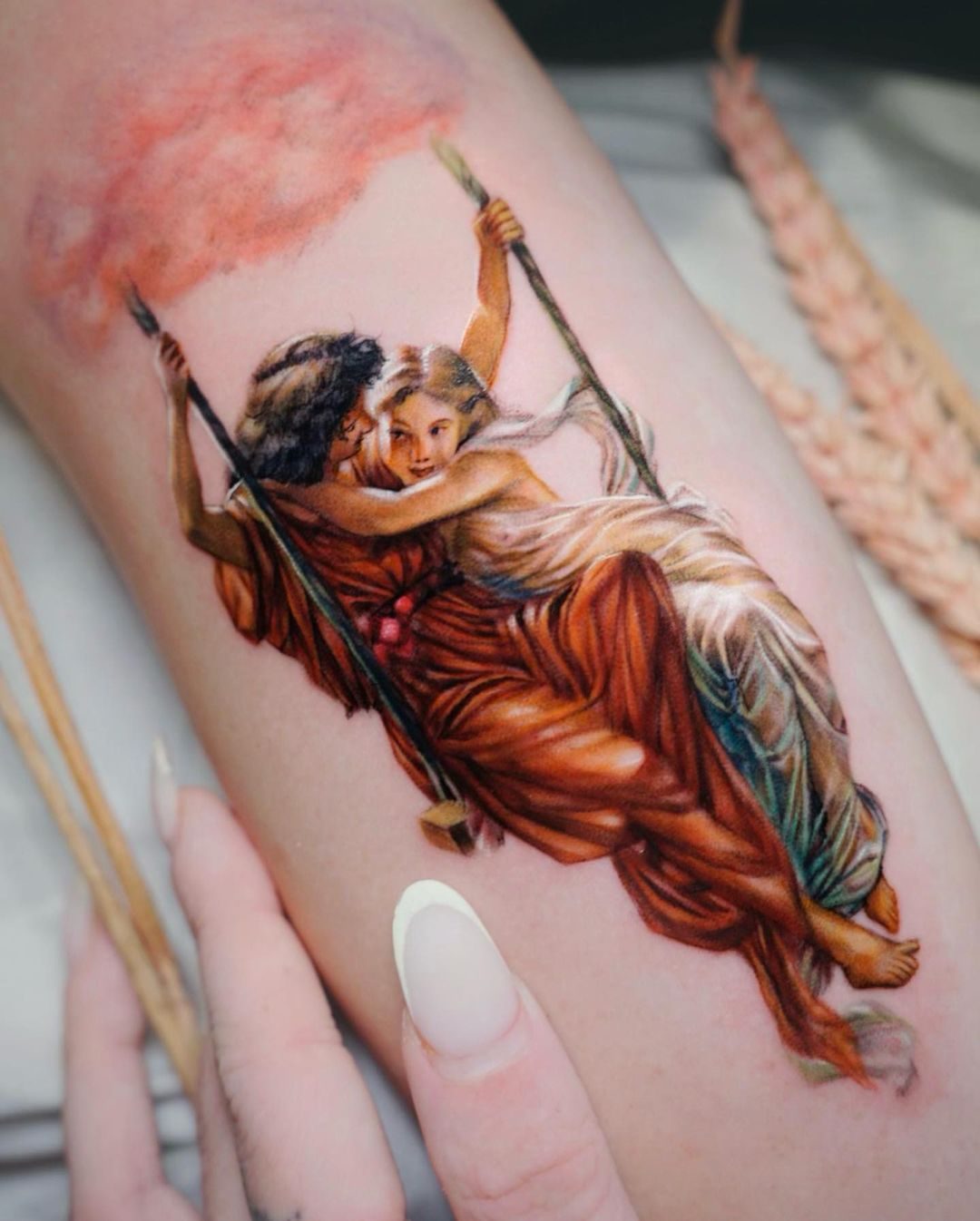 Full colour mini realism mermaid tattoo on a forearm by Ink District Amsterdam